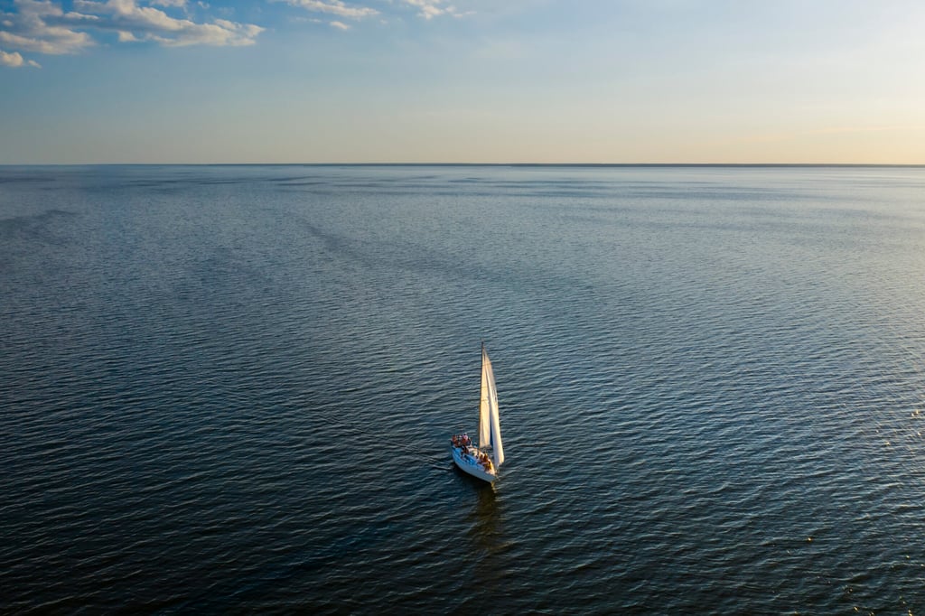 Kiawah Island sailing at sunset. Luxury vacation at sea.