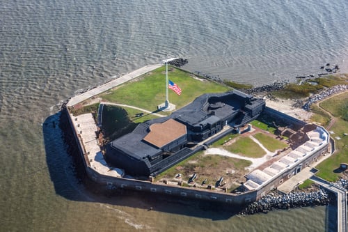 Aerial photo of Fort Sumter with flag at half staff taken December 4, 2018 during a period of mourning for the death of the 41st President of the United States, George H W Bush.